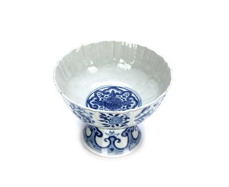 Blue and white stem bowlChinese, 20th Centurypainted with sprigs of flowers, pomegranates, finger citron and peaches in the K