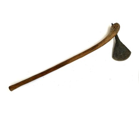 An African possibly Zulu tribal battle axe, the tang with fan shaped head, 80cmL, tang 13cmW 