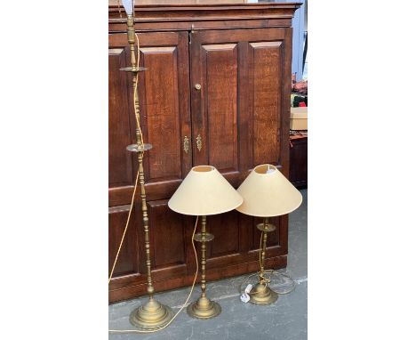 A matched pair of tall brass table lamps, with shades, 85cmH to top of shade; together with a matching standard lamp, 158cm t