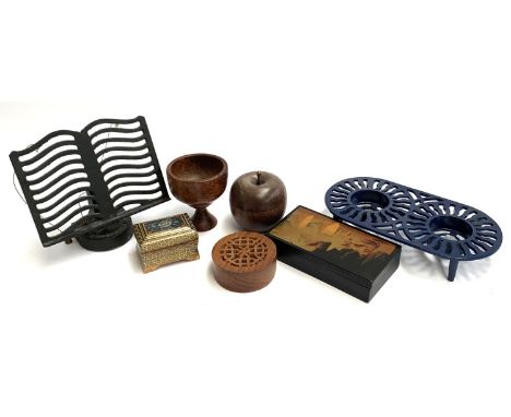 A mixed lot to include turned burr wood goblet, cast iron recipe book stand, cast iron enamel warmer, etc 