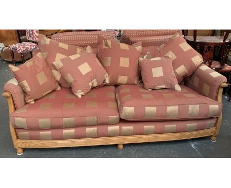 A contemporary Ercol three seater sofa, light oak and upholstered in a large check, approx. 190cmW