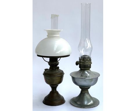 A copper oil lamp with chimney and milk glass shade, 52cmH overall, together with one other 