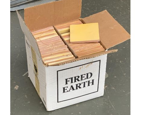 A box of pale yellow fired earth tiles, approx. 80, each tile approx. 11x11cm 
