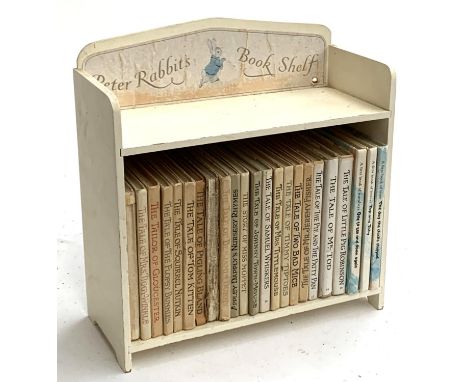 Beatrix Potter, 20 volumes, in a 'Peter Rabbit's Book Shelf' 