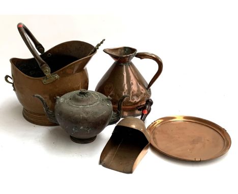 A one gallon copper conical measure, with VR cypher; copper helmet coal scuttle, a twin spouted teapot (stand absent) etc 