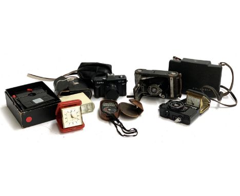 A mixed lot of photographic equipment to include a Kodak Junior no.1, Bellows Camera; Konica AF3; Franka NX-40; flash unit; l