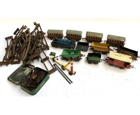 A quantity of O gauge model trains and track, to include Chad Valley locomotive 10138 