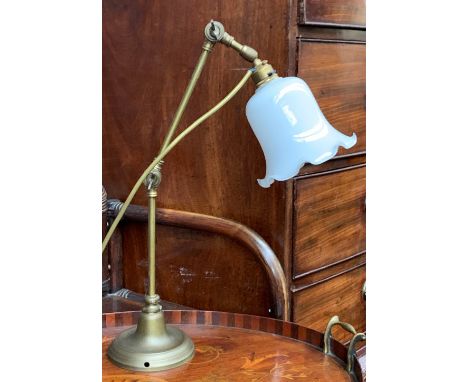 An adjustable brass table lamp, with milk glass shade, approx. 46cmH 