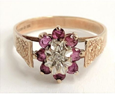 A 9ct gold, ruby and diamond ring, 2.3g, approx. size O 