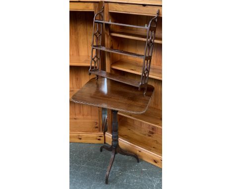 A pierced mahogany wall shelf, 46cmW; together with a 19th century rectangular tripod table, 73cmH 