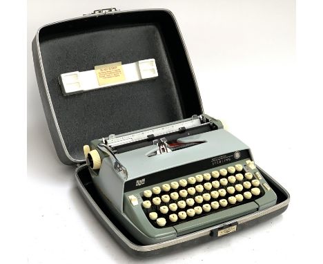 A Smith Corona Sterling typewriter in hard case 