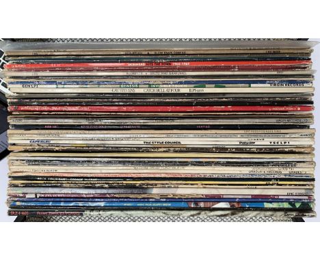 A mixed lot of approx. 40 pop and rock vinyl LPs to include David Bowie, Bob Dylan, Skinhead, Cat Stevens, etc 