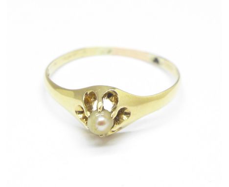 A yellow metal and pearl set ring, marked 14k, 1.3g, P, (reset with a pearl)