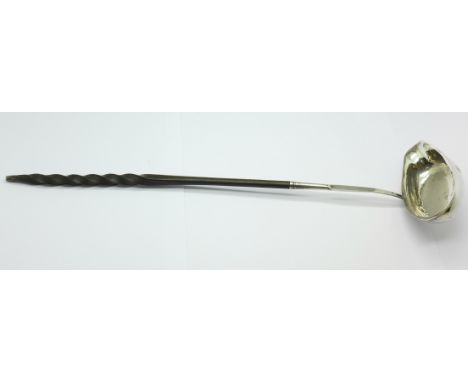 A William IV silver and whalebone ladle, London 1834