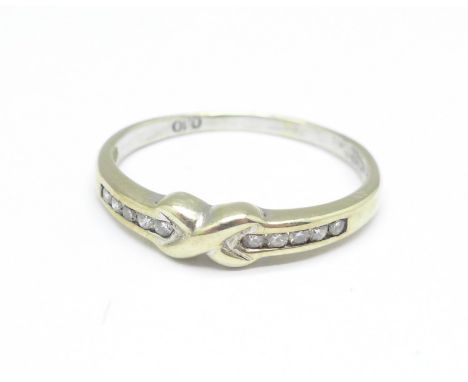 A 9ct gold and ten stone diamond ring, 1.5g, M