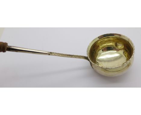 A white metal ladle, bears initials, a/f, two dents