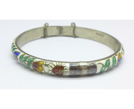 An enamelled silver bangle