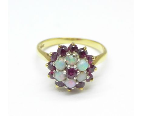 An 18ct gold, opal and ruby cluster ring, 4g, M