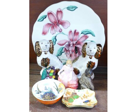 A Royal Staffordshire Orchid Dinnerware plate designed by Clarice Cliff, two small Royal Doulton figures, Rose and The Old Ba