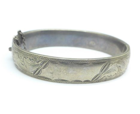A silver wax filled bangle, 30.3g