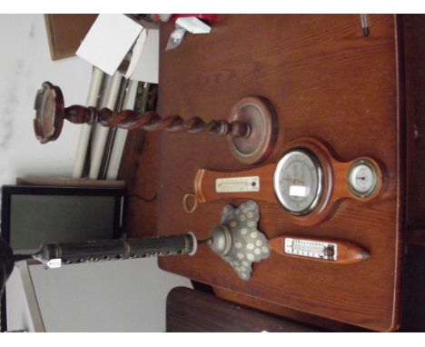 Barometer, 2 ashtrays and a shuttle thermometer
