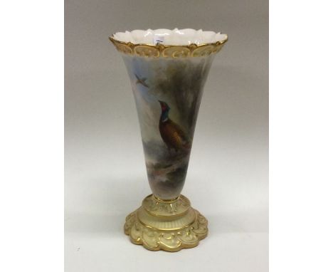 An attractive Royal Worcester vase depicting pheasants. Est. £30 - £50.