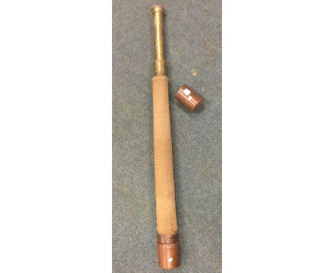 A good brass mounted and leather telescope. Est. £50 - £80.