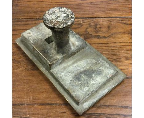 An Ordnance Survey benchmark in brass for Scotland. Est. £30 - £40.