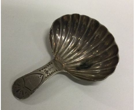 A George III silver caddy spoon with fluted bowl. London 1802. By Duncan Urquhart &amp; Naphtali Hart. Approx. 11 grams. Est.