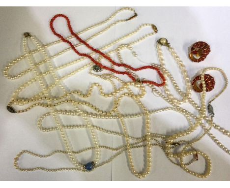 A box containing pearl necklaces etc. Est. £20 - £30.