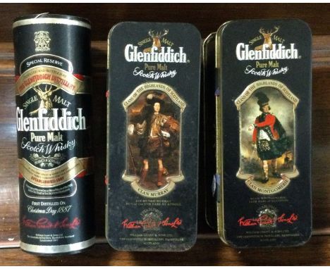 Three miniature 5 cl bottles of Glenfiddich Pure Malt Scotch Whisky; one contained within a box, the other two in tins. (3)