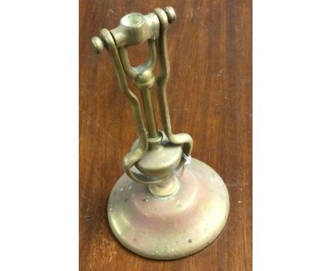 A brass mounted lamp holder. Est. £20 - £30.
