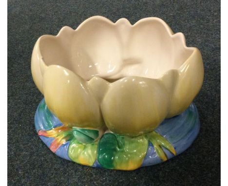A Clarice Cliff pottery jardiniere. Est. £30 - £40.