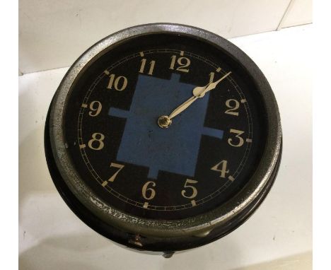 An unusual black faced clock of stylised form. Est. £30 - £50.
