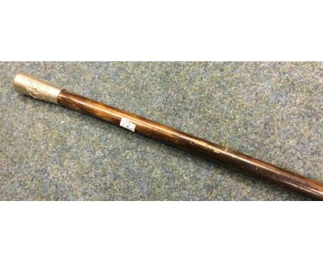 A World War II swagger stick. Est. £20 - £30.