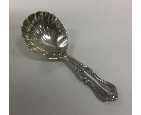 EXETER: A heavy Victorian silver caddy spoon. 1886. By Josiah Williams. Approx. 26 grams. Est. £50 - £80.
