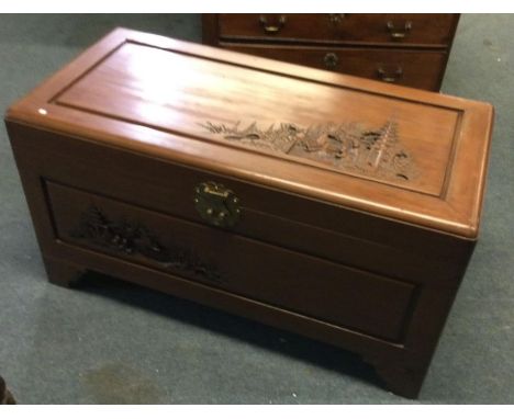 A small Camphor wood trunk. Est. £20 - £30.