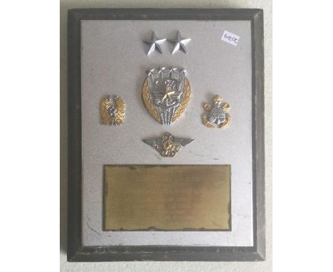 A Military plaque presented to "Group Captain R H B Dixon. Air Attache embassy of the United Kingdom of Great Britain, Korea 