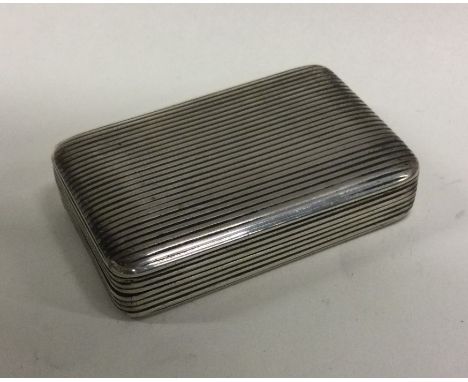 A George III silver snuff box with reeded decoration. Birmingham 1813. By Thomas Wilmore. Approx. 51 grams. Est. £150 - £200.
