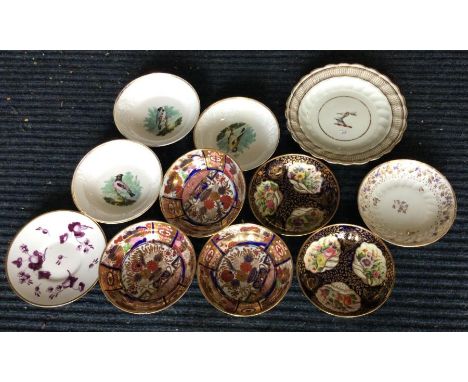 A good collection of saucers etc. Est. £10 - £20.