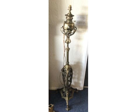 A large brass Arts &amp; Crafts lamp. Est. £100 - £150.