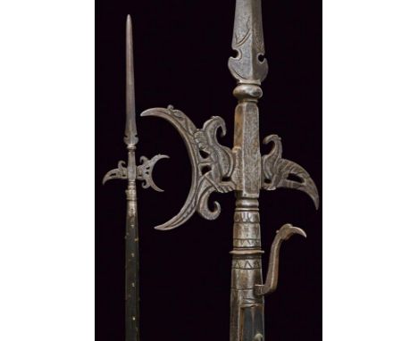 dating: 17th Century provenance: Italy, Hollow axe and fluke curved downwards, carved and pierced with stylized birds, center
