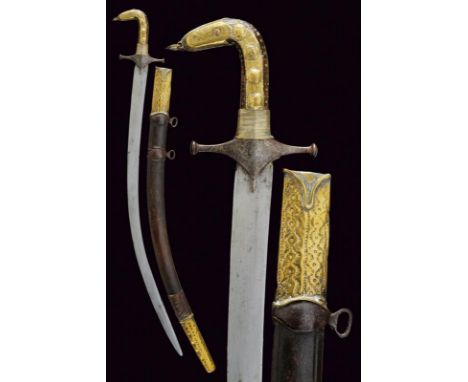 dating: 19th Century provenance: Syria, Curved, flat, single-edged blade (in damask?); iron cross hilt, handle with wooden gr