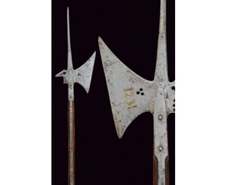 dating: circa 1600 provenance: Germany, Oblique-edged axe featuring a triple hole at the base, the rear-fluke curved downward