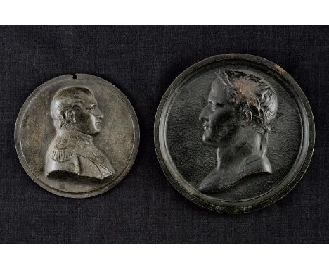 dating: 19th Century provenance: France, Two black metal medallions with the Emperor's profile in high relief, once with laur