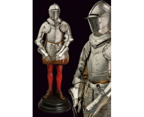 dating: early 17th Century provenance: Swiss, Helmet with skull worked in two halves linked at the lower comb. Adjustable vis
