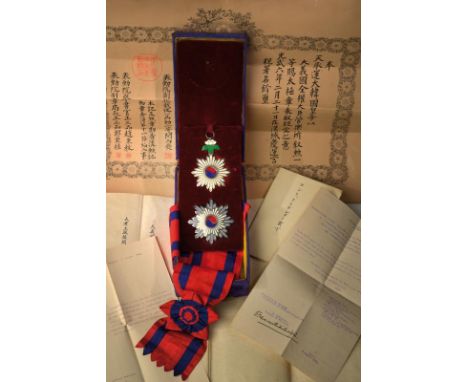 dating: circa 1900 provenance: Korea, A set of silver and enameled Grand Cross. The pendent with small chips, the star in per