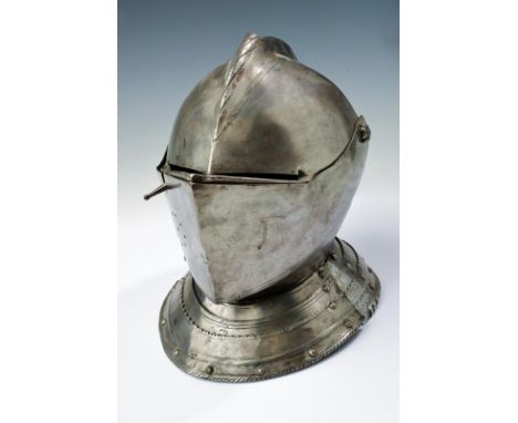 dating: circa 1600 provenance: Europe, More antique skull, worked in one piece with the low, twisted comb, restored plume-hol
