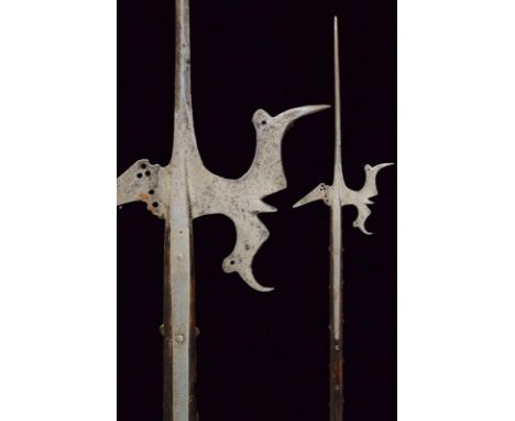 dating: early 16th Century provenance: Italy, Long cusp of lozenge section, the axe worked with wings and a small cusp at the