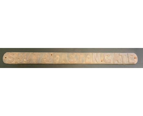 A cast iron sign, Shut and Fasten Gate, 84.5cm x 7.5cm 